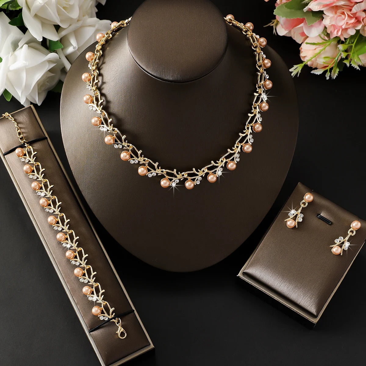 4pcs women's jewelry set with pearl rhinestone necklace, earrings, bracelets.