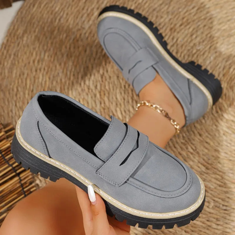 Fashionable lady's loafersleather low-top thick heel one-piece casual shoes.