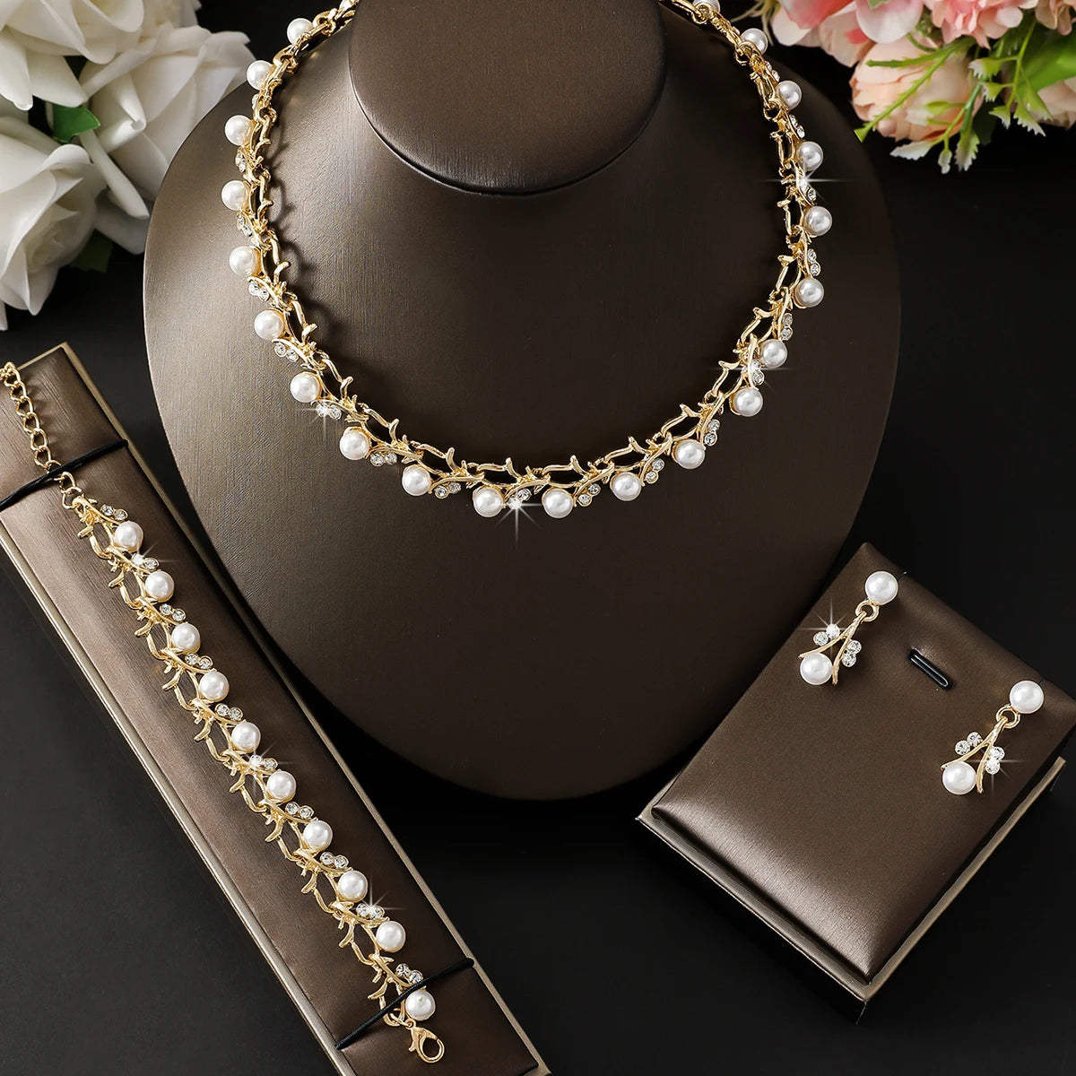 4pcs women's jewelry set with pearl rhinestone necklace, earrings, bracelets.