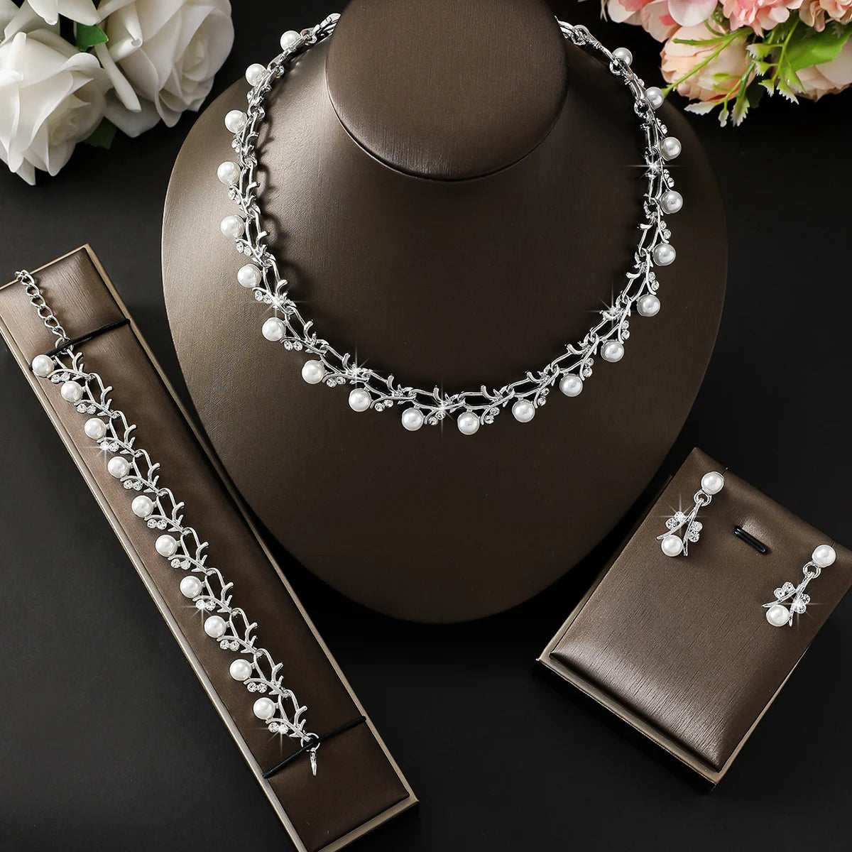 4pcs women's jewelry set with pearl rhinestone necklace, earrings, bracelets.