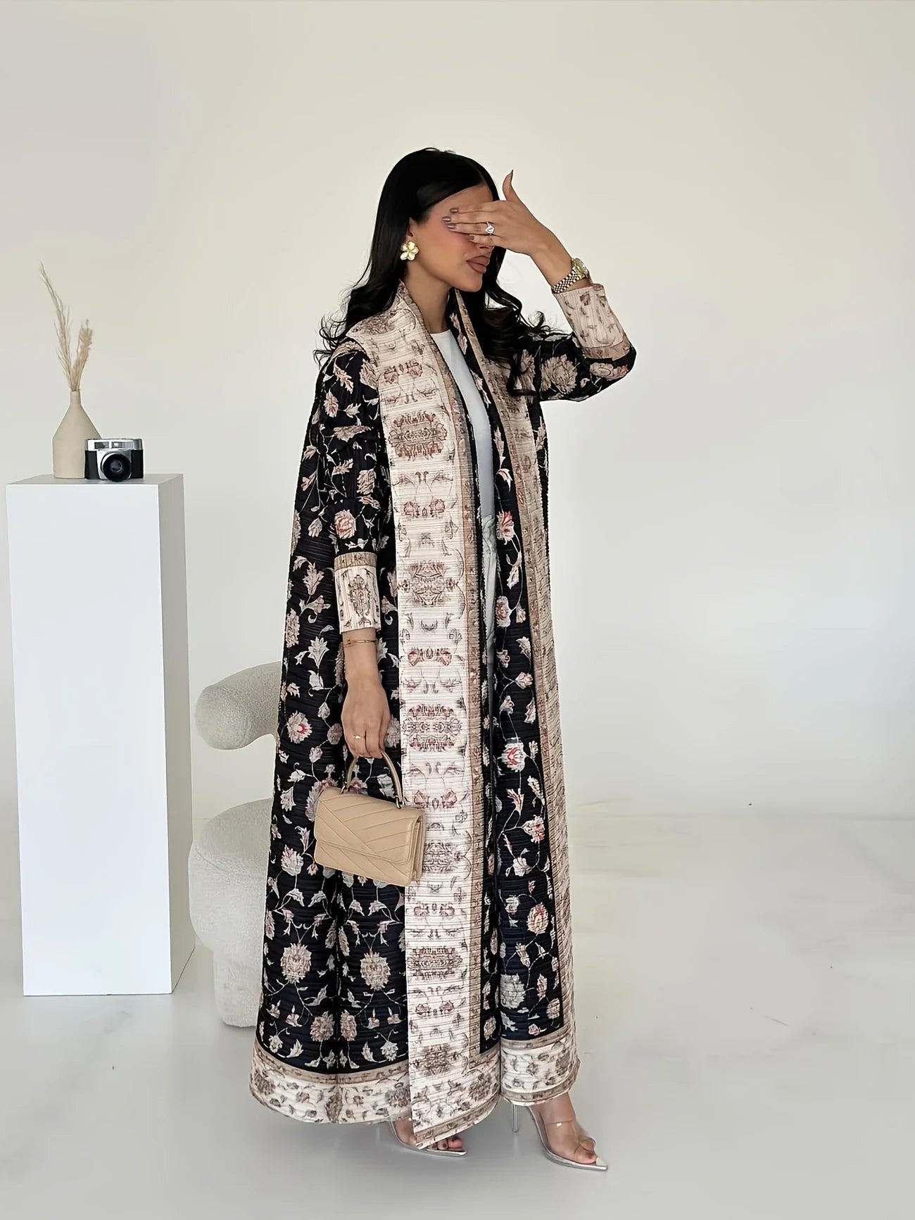 wear a long robe  abaya, with an outer cardigan