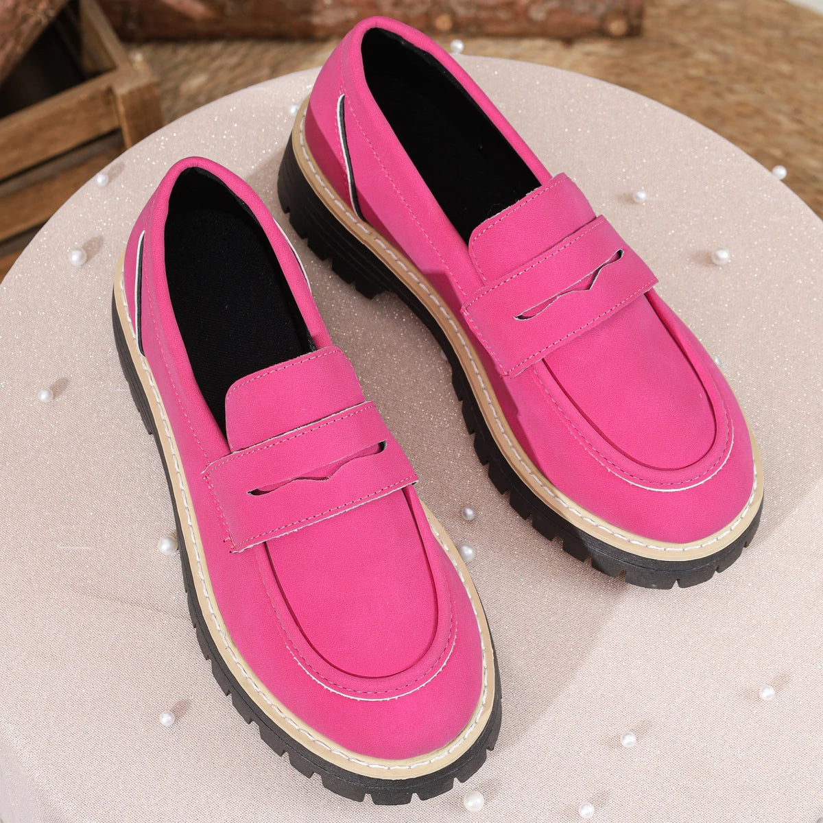 Fashionable lady's loafersleather low-top thick heel one-piece casual shoes.