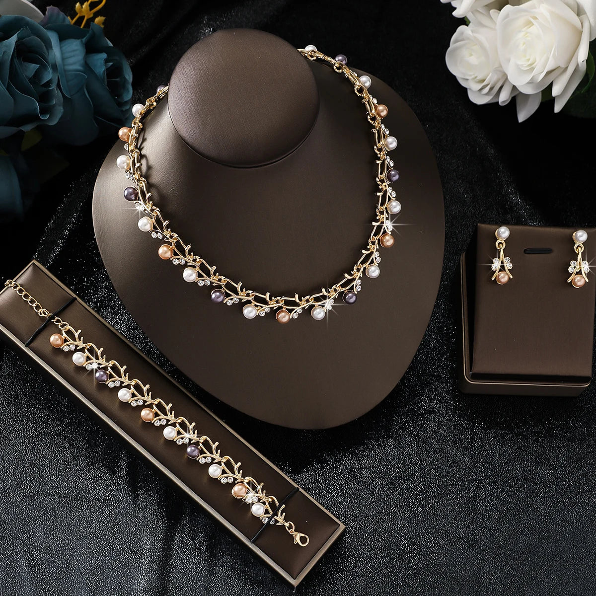 4pcs women's jewelry set with pearl rhinestone necklace, earrings, bracelets.