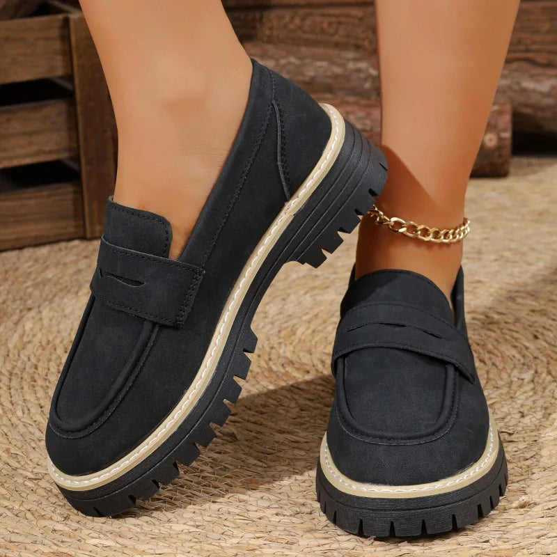 Fashionable lady's loafersleather low-top thick heel one-piece casual shoes.